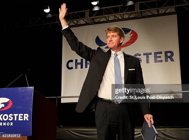 Democrat Chris Koster waves to the crowd as he exits the stage after conceding the race for governor to Republican Eric Greitens as he addresses his...