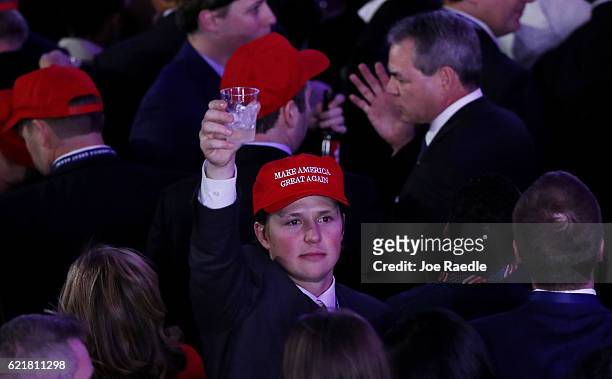 People attend Republican presidential nominee Donald Trumps election night event at the New York Hilton Midtown on November 8, 2016 in New York...