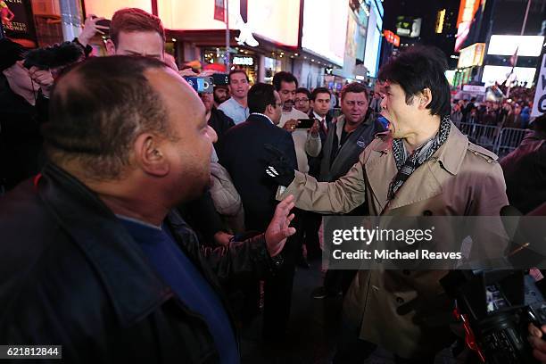 Donald Trump supporters and protestors argue in Times Square as they await election results on November 8, 2016 in New York City. Trump was leading...