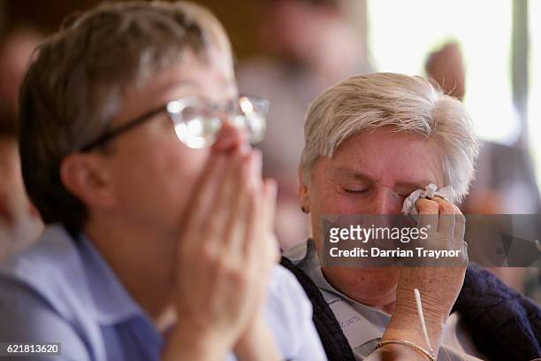 Democrat voters react while watching the election results during a 'Democrats Abroad' event in Melbourne on November 9, 2016 in Melbourne, Australia....