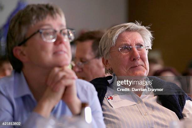 Democrat voters react as they watch the election result during a 'Democrats Abroad' event in Melbourne on November 9, 2016 in Melbourne, Australia....