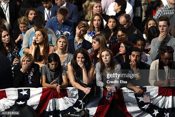 People react to the voting results at Democratic presidential nominee former Secretary of State Hillary Clinton's election night event at the Jacob...