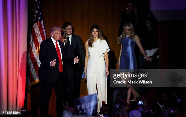 Republican president-elect Donald Trump acknowledges walks on stage with his son Barron Trump, wife Melania Trump, Jared Kushner, and Tiffany Trump...