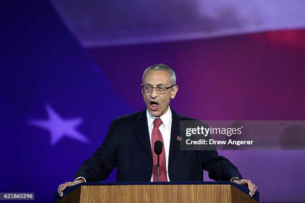 Campaign chairman John Podesta announces on stage that Democratic presidential nominee former Secretary of State Hillary Clinton will not speak on...