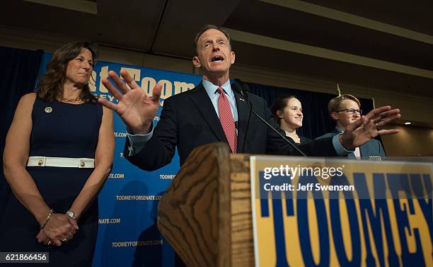 Senator Pat Toomey of Pennsylvania speaks supporters as his wife Kris Toomey looks on following his election victory in a highly-contested,...