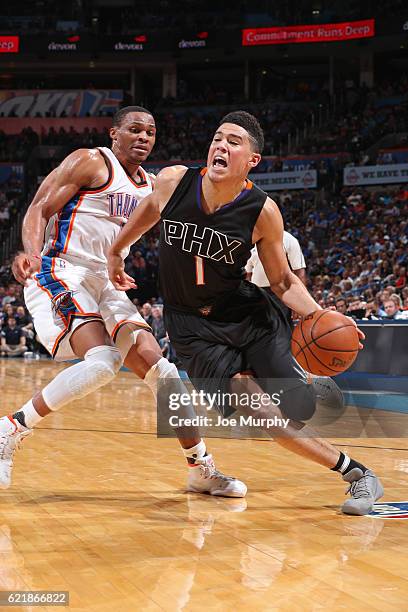 Devin Booker of the Phoenix Suns drives to the basket against the Oklahoma City Thunder on October 28, 2016 at the Chesapeake Energy Arena in...