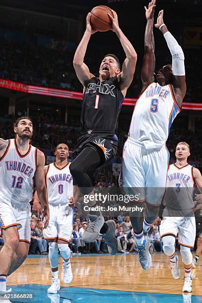 Devin Booker of the Phoenix Suns shoots a lay up against the Oklahoma City Thunder on October 28, 2016 at the Chesapeake Energy Arena in Oklahoma...