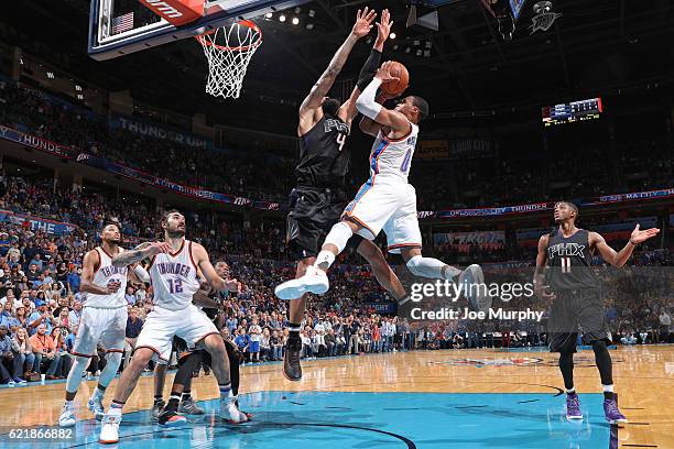 Russell Westbrook of the Oklahoma City Thunder shoots a lay up against the Phoenix Suns on October 28, 2016 at the Chesapeake Energy Arena in...