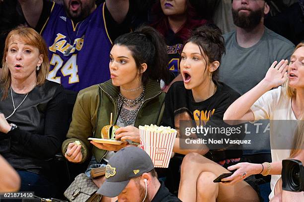 Kendall Jenner and Bella Hadid attend a basketball game between the Dallas Mavericks and the Los Angeles Lakers at Staples Center on November 8, 2016...