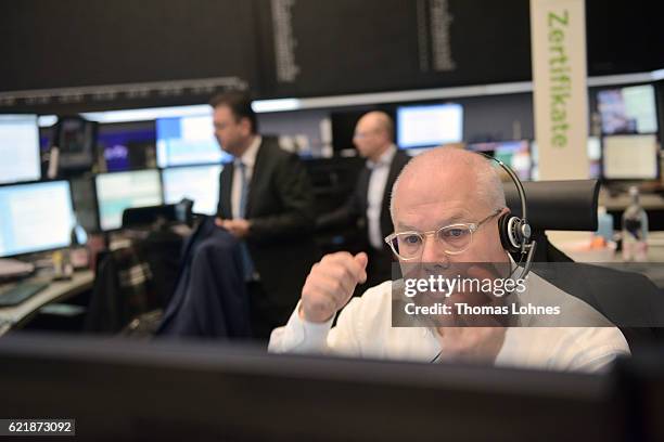 Trader reacts at the Frankfurt Stock Exchange on November 9, 2016 in Frankfurt, Germany. Stock markets around the world reacted with volatility to...