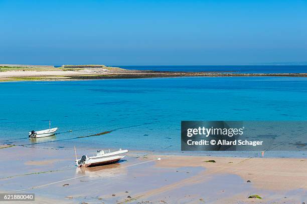 alderney coastline at low tide - island of alderney stock pictures, royalty-free photos & images