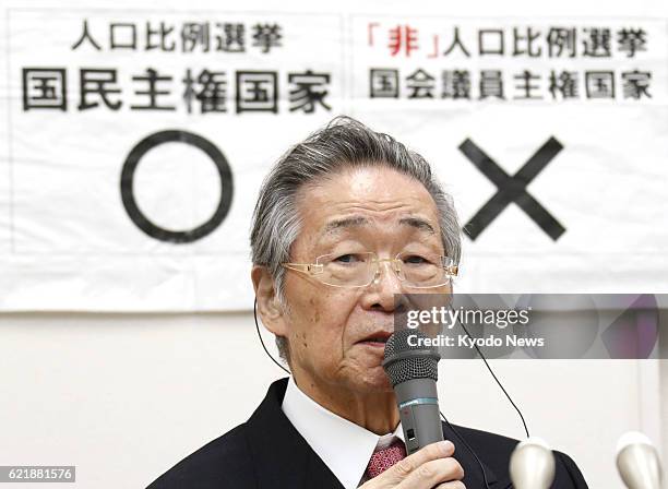 Hidetoshi Masunaga, a lawyer for the plaintiffs, holds a press conference in Nagoya on Nov. 8 after the Nagoya High Court ruled the vote weight gap...