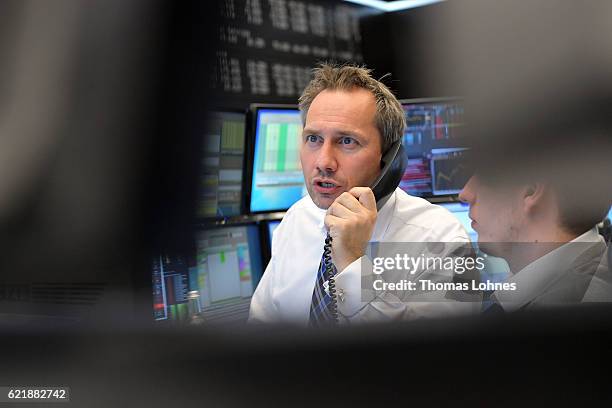 Trader react at the Frankfurt Stock Exchange on November 9, 2016 in Frankfurt, Germany. Stock markets around the world reacted with volatility to the...