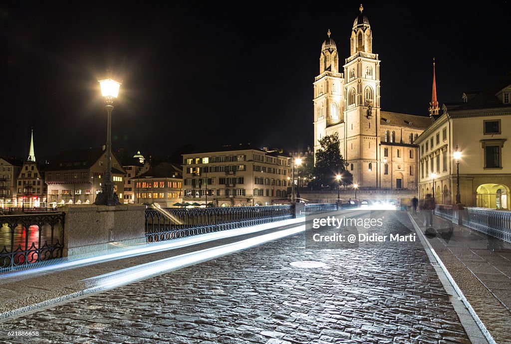 Traffic light trails in Zurich old town at night in Switzerland