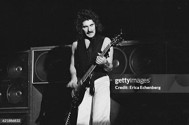 Bassist Geezer Butler of Black Sabbath performs on stage at Hammersmith Odeon, London, January 1976.