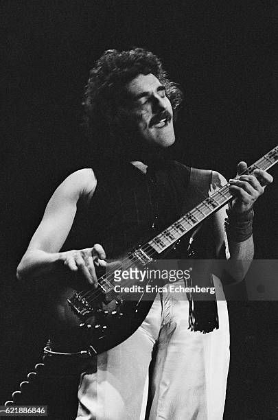 Bassist Geezer Butler of Black Sabbath performs on stage at Hammersmith Odeon, London, January 1976.