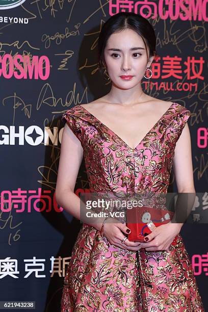 Actress Yang Mi arrives at the red carpet during the third anniversary of Cosmo on November 9, 2016 in Shanghai, China.
