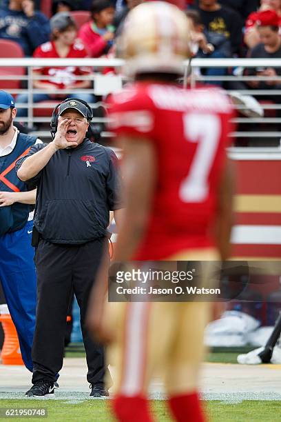 Head coach Chip Kelly of the San Francisco 49ers yells instructions to Colin Kaepernick during the second quarter against the New Orleans Saints at...