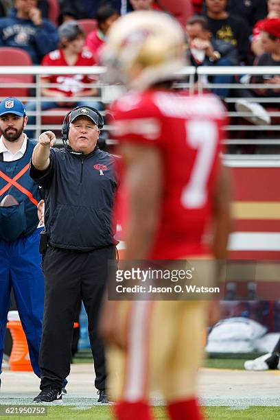 Head coach Chip Kelly of the San Francisco 49ers yells instructions to Colin Kaepernick during the second quarter against the New Orleans Saints at...