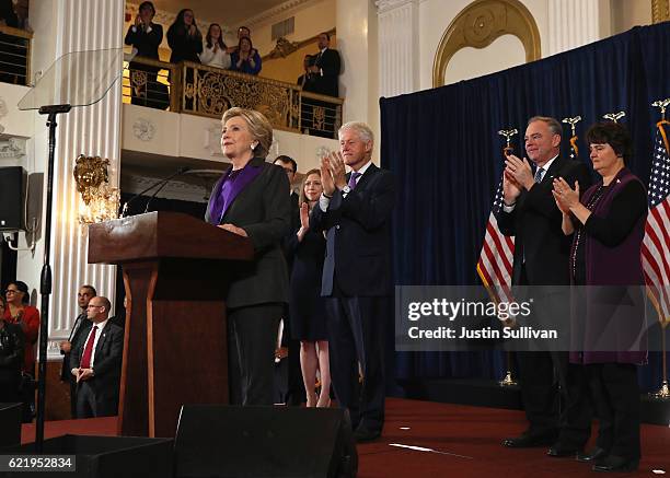 Former Secretary of State Hillary Clinton concedes the presidential election as Chelsea Clinton, Bill Clinton, Tim Kaine and Anne Holton listen at...