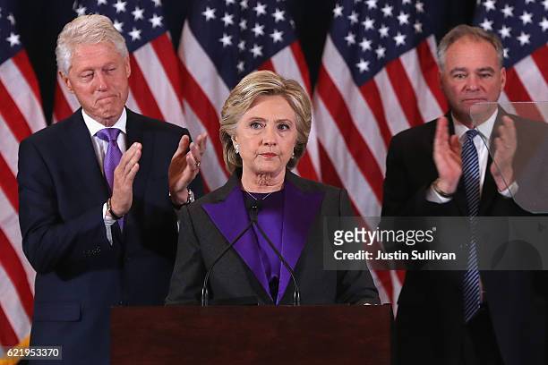 Former Secretary of State Hillary Clinton, accompanied by her husband former President Bill Clinton and running mate Tim Kaine, concedes the...