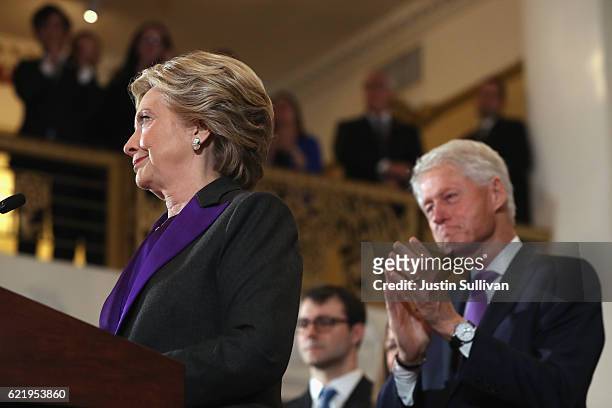 Former Secretary of State Hillary Clinton, accompanied by her husband former President Bill Clinton, concedes the presidential election at the New...