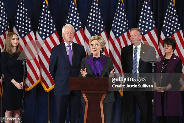 Former Secretary of State Hillary Clinton concedes the presidential election as Chelsea Clinton, Bill Clinton, Tim Kaine and Anne Holton listen at...