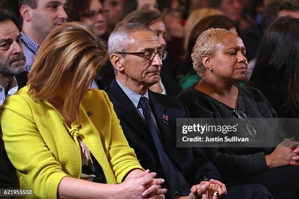 Campaign chairman John Podesta listens as former Secretary of State Hillary Clinton concedes the presidential election at the New Yorker Hotel on...