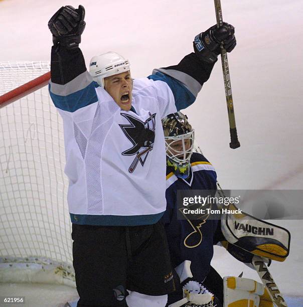 Marco Sturm the San Jose Sharks celebrates Owen Nolan's goal against the St. Louis Blues during period two of game 4 of the Western Conference...