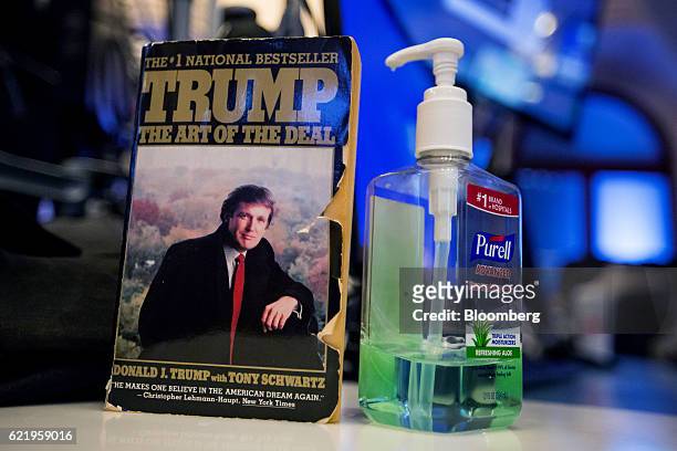 The book "The Art Of The Deal" by U.S. President-elect Donald Trump is displayed on top of a desk on the floor of the New York Stock Exchange in New...