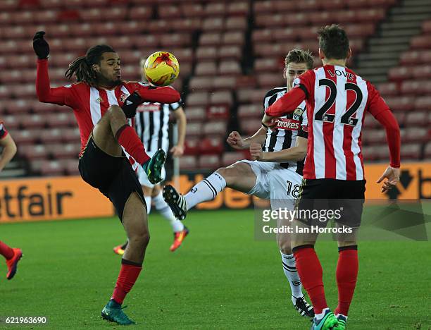 Jason Denayer of Sunderland competes with Elliot Newitt of Notts County during the Checkatrade Trophy group stage match between Sunderland and Notts...