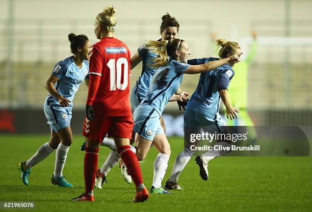 Keira Walsh of Manchester City Women celebrates with team mates as she scores their first goal during the UEFA Women's Champions League round of 16,...