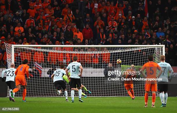 Davy Klaassen of the Netherlands scores their first goal from a penalty during the international friendly match between Netherlands and Belgium at...