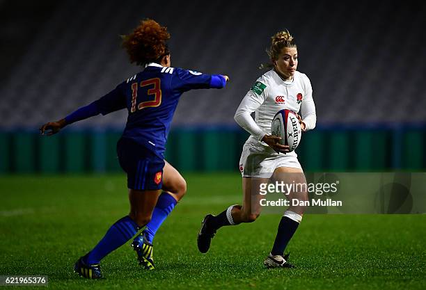 Fiona Pocock of England takes on Rose Thomas of France during the Old Mutual Wealth Series match between England Women and France Women at Twickenham...