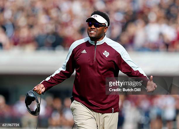 Head coach Kevin Sumlin of the Texas A&M Aggies reacts to a call during the first half of an NCAA college football game against the Mississippi State...
