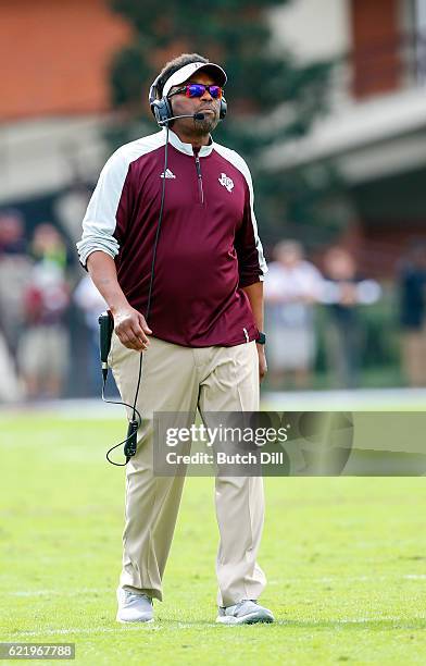 Head coach Kevin Sumlin of the Texas A&M Aggies walks the sideline during the first half of an NCAA college football game against the Mississippi...