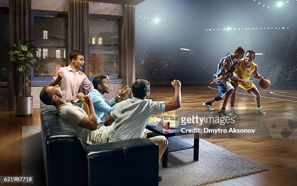 students watching very realistic basketball game at home - basketball stadium stockfoto's en -beelden