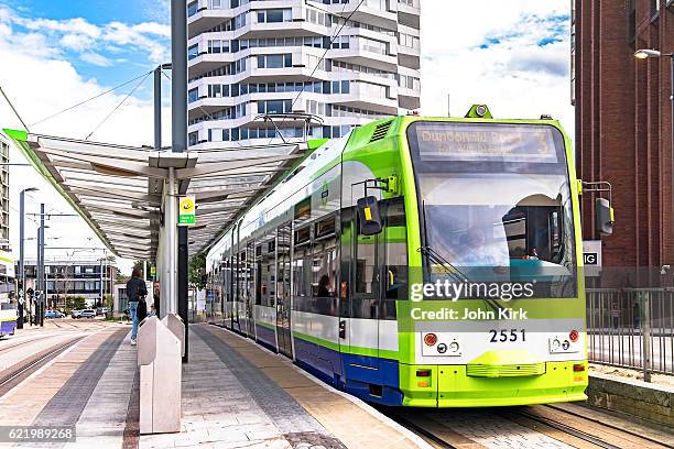 london tramlink tram 2551 departing croydon stop - croydon england stock pictures, royalty-free photos & images