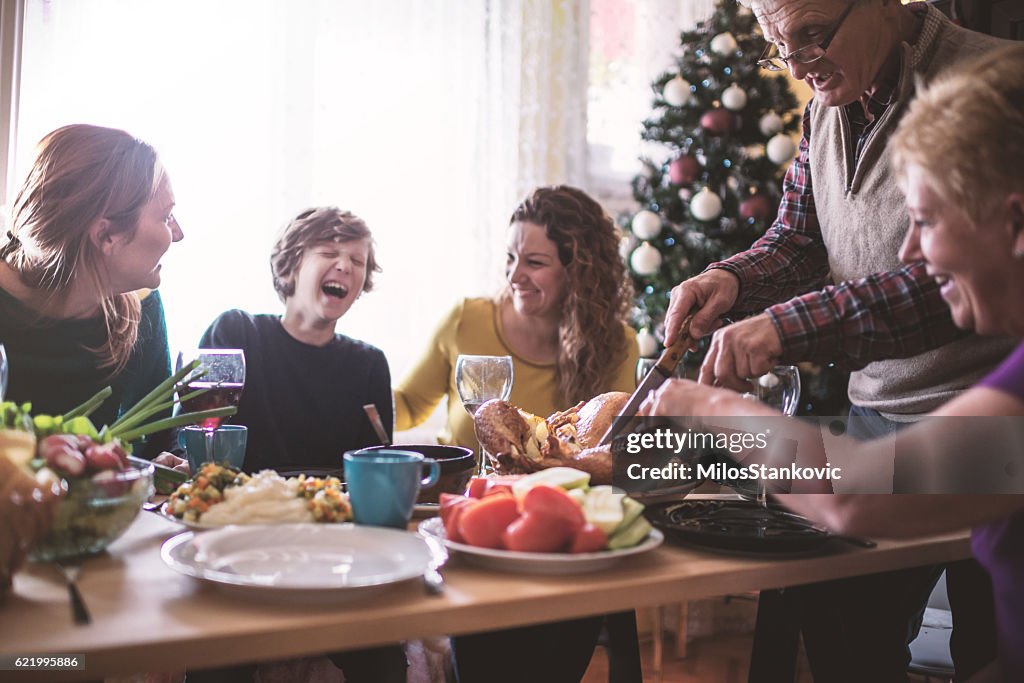 Family having Christmas dinner