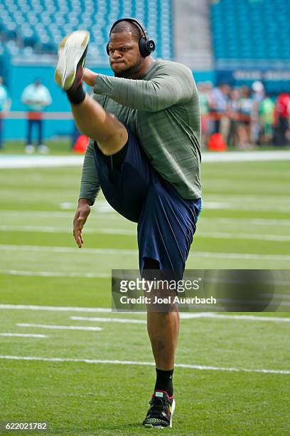 Mike Pouncey of the Miami Dolphins stitches prior to the game against the New York Jets on November 6, 2016 at Hard Rock Stadium in Miami Gardens,...