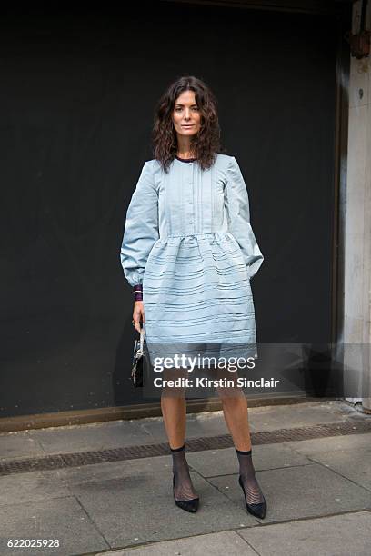 Fashion blogger Hedvig Opshaug wears a Roksanda Illincic dress, Chanel shoes day 4 of London Womens Fashion Week Spring/Summer 2016, on September 19,...