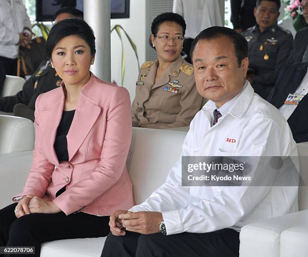 Thailand - Thai Prime Minister Yingluck Shinawatra and Honda Motor Co. President Takanobu Ito attend a groundbreaking ceremony for Honda's new plant...