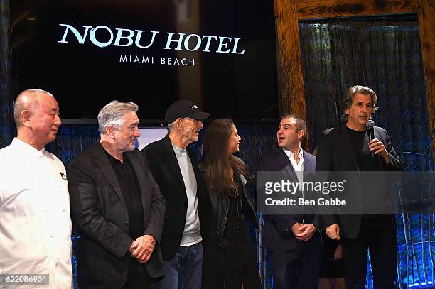 Nobu Matsuhis, Robert DeNiro, Meir Teper, Andrea Chapur, Rodrigo Chapur and David Rockwell speak onstage during the Nobu Hotel Miami Beach launch VIP...