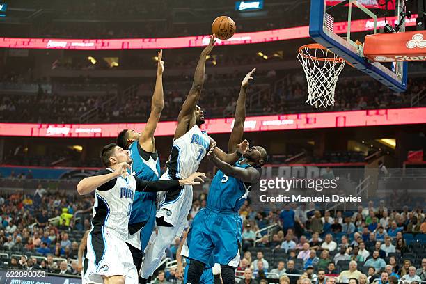 Serge Ibaka of the Orlando Magic attempts a shot against Gorgui Dieng of the Minnesota Timberwolves during the game on November 9, 2016 at Amway...