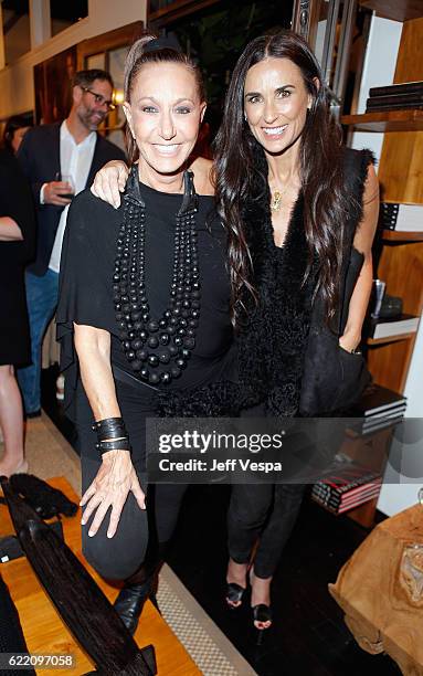 Fashion designer Donna Karan and actress Demi Moore attend the Urban Zen LA Opening on November 9, 2016 in Los Angeles, California.