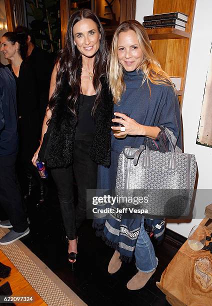 Actresses Demi Moore and Maria Bello attend the Urban Zen LA Opening on November 9, 2016 in Los Angeles, California.