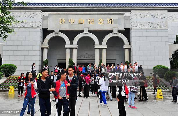 This picture taken on November 9, 2016 shows Chinese students and tourists visiting the former residence of republican revolutionary Sun Yat-sen, now...