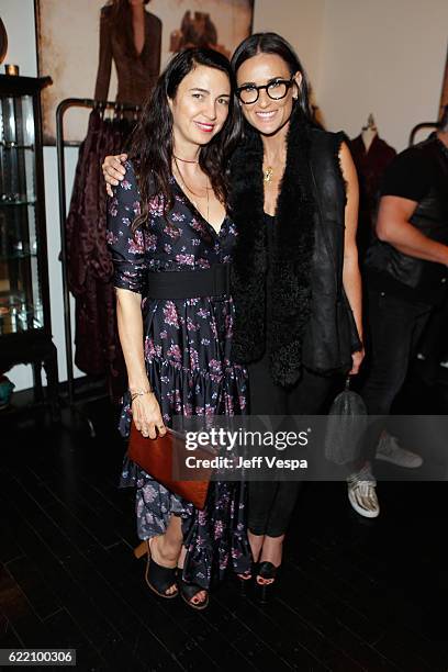 Actresses Shiva Rose and Demi Moore attend the Urban Zen LA Opening on November 9, 2016 in Los Angeles, California.