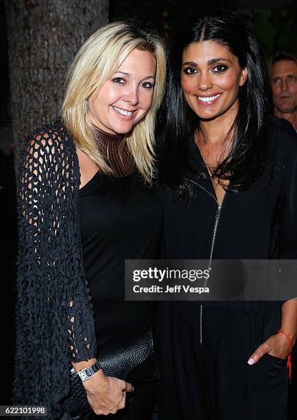 Erica Zohar and fashion designer Rachel Roy attend the Urban Zen LA Opening on November 9, 2016 in Los Angeles, California.