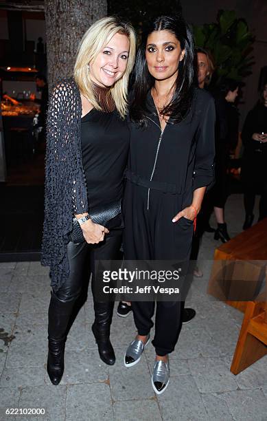 Erica Zohar and fashion designer Rachel Roy attend the Urban Zen LA Opening on November 9, 2016 in Los Angeles, California.